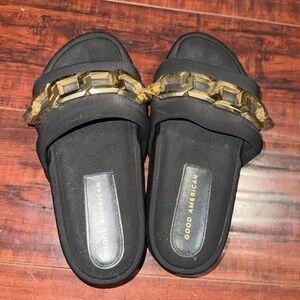 Good American Black Sandals with Gold Chain Accent